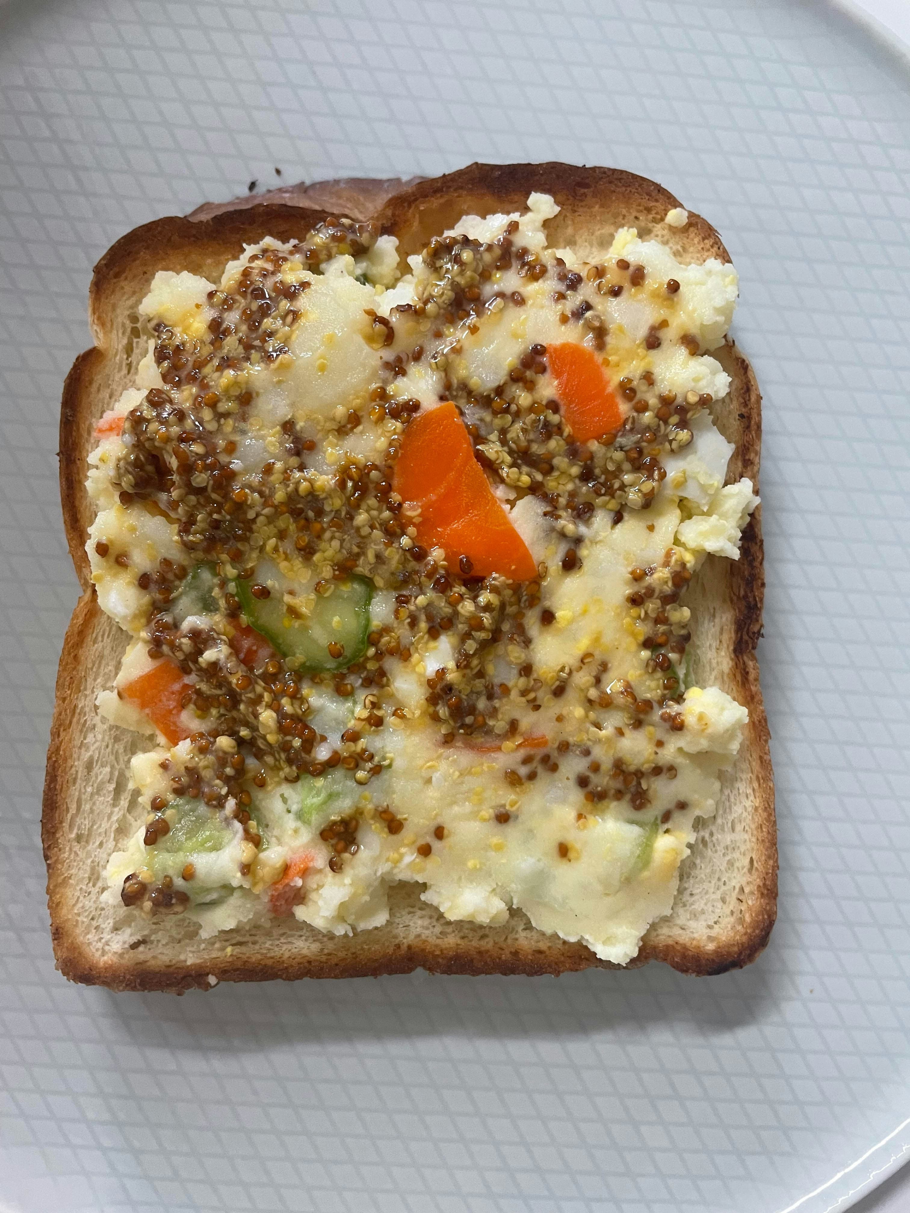 Classic sandwich with fresh vegetables, cheese and mustard on toasted bread